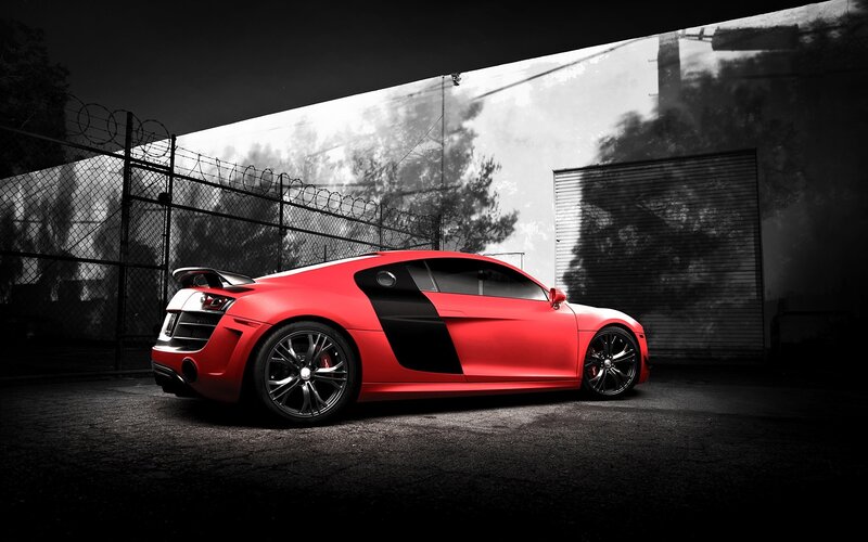 Red sports car in urban setting