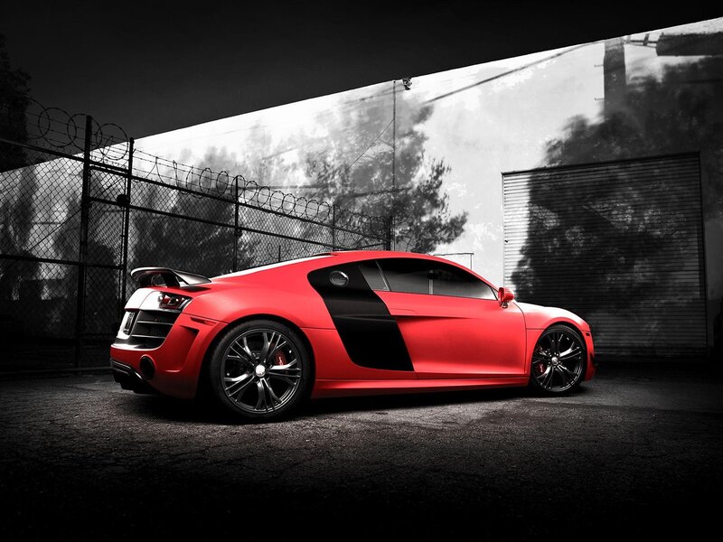 Red sports car in urban setting