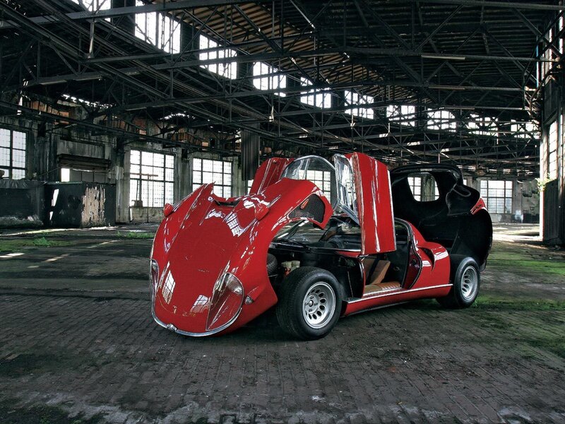 Red sports car in warehouse