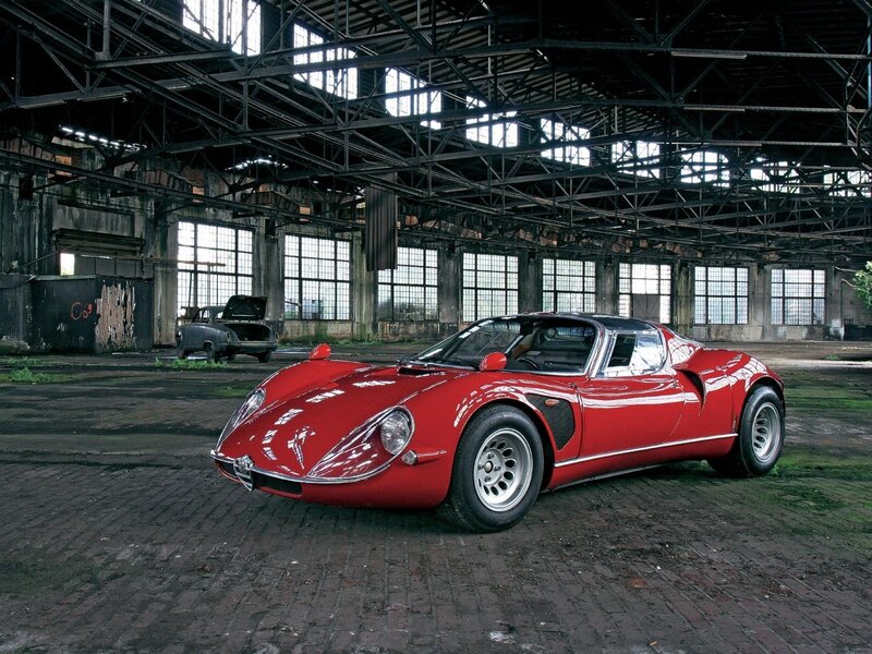 Red sports car in warehouse