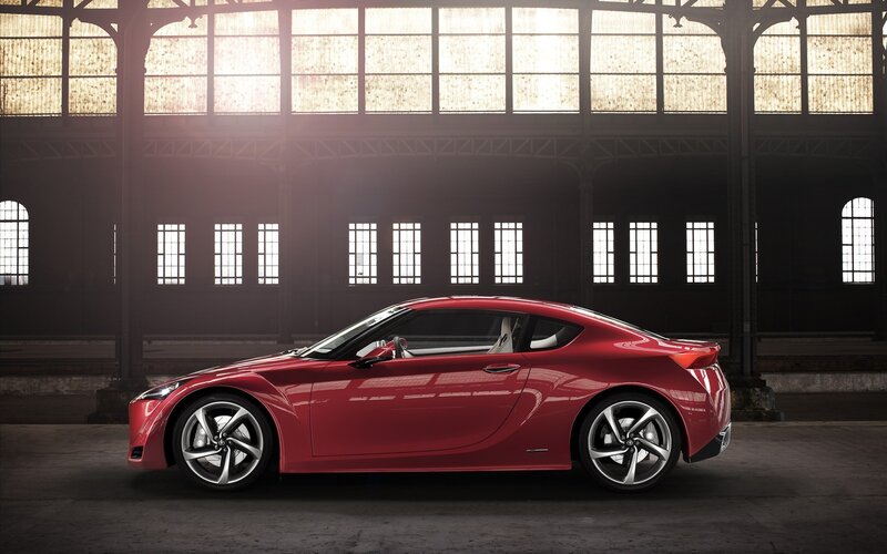 Red sports car in warehouse
