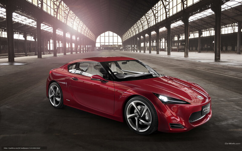 Red sports car in warehouse