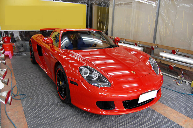 Red sports car in workshop