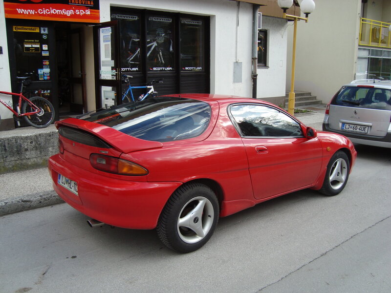 Red Sports Car — Neutral, Afternoon, Photograph, Bicycle