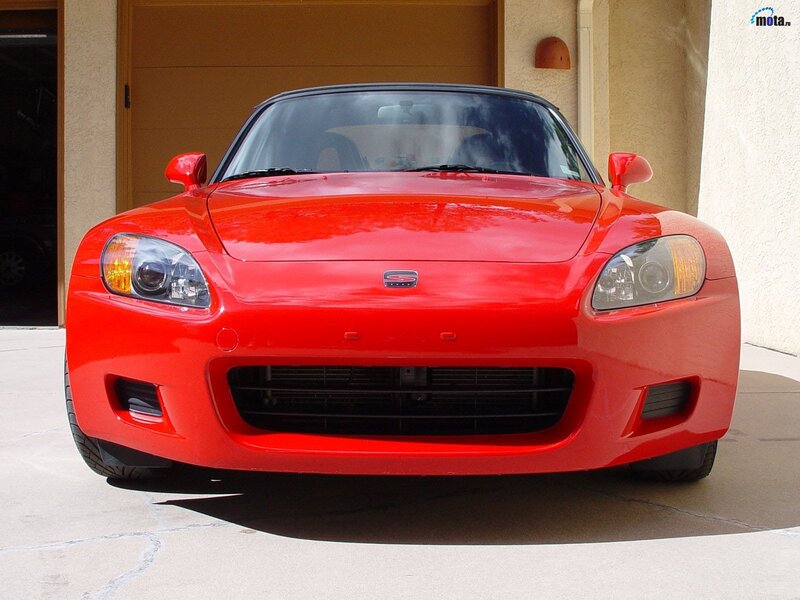 Red Sports Car — Neutral, Afternoon, Photograph, Garage Door