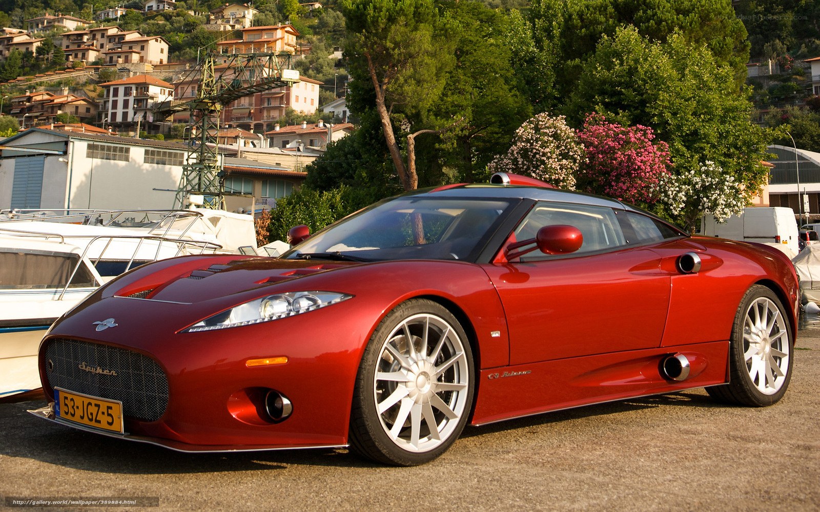 Red sports car on a hillside