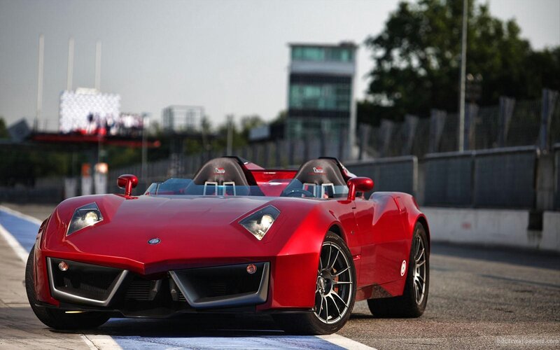 Red sports car on a racetrack