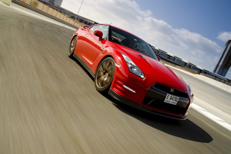 Red sports car on a racetrack