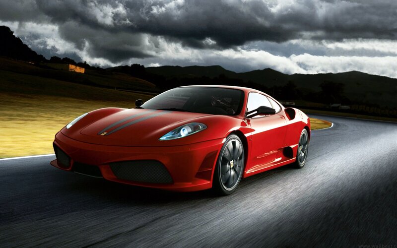 Red sports car on a racetrack