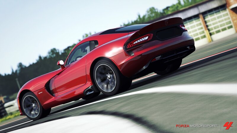 Red sports car on a racetrack