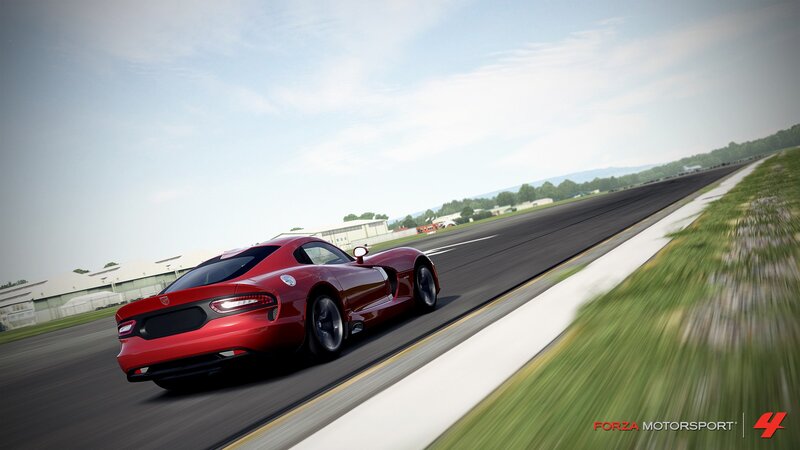 Red sports car on a racetrack
