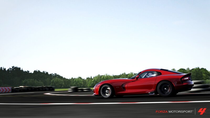 Red sports car on a racetrack