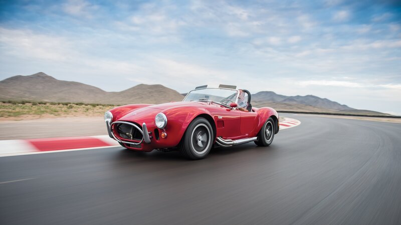 Red sports car on a racetrack