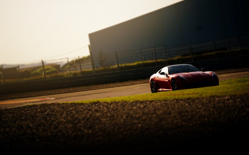 Red sports car on a racetrack