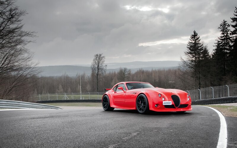 Red sports car on a racetrack