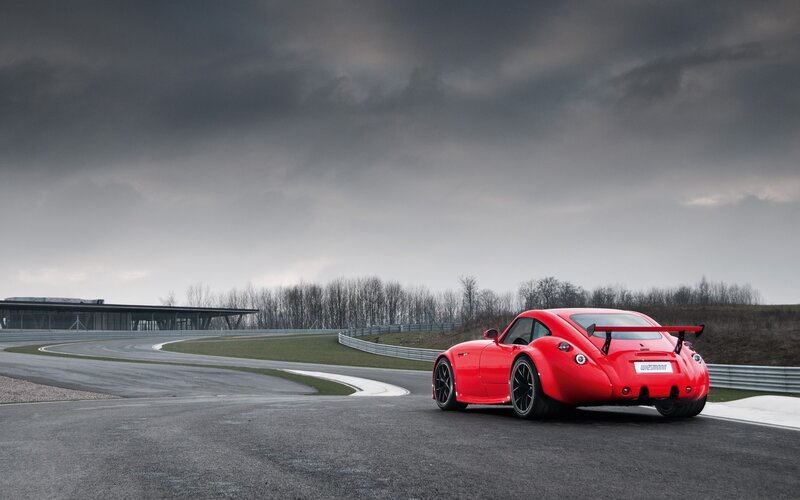 Red sports car on a racetrack
