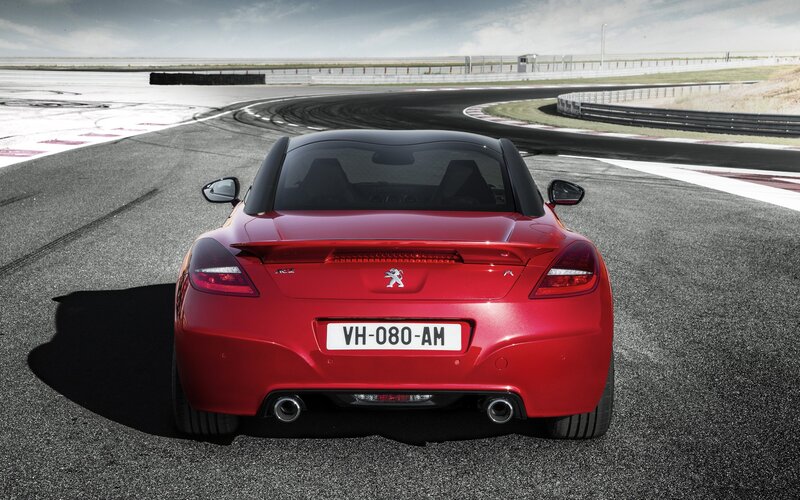 Red sports car on a racetrack