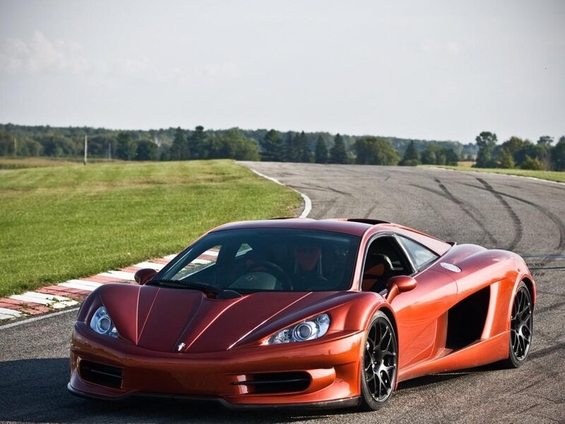 Red sports car on a racetrack