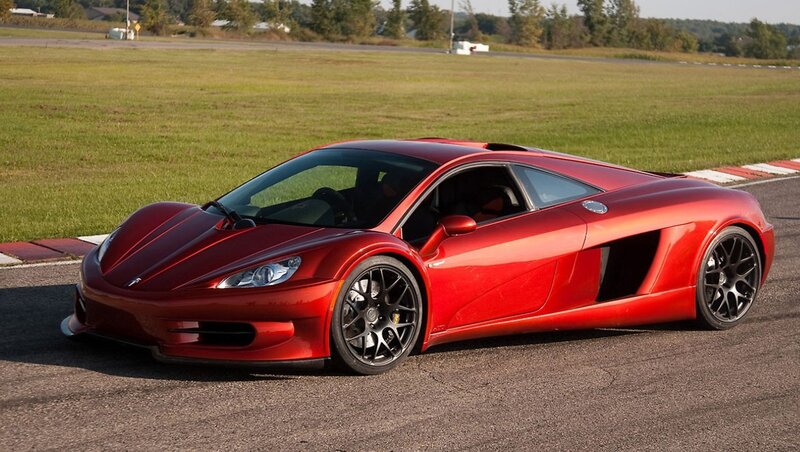 Red sports car on a racetrack