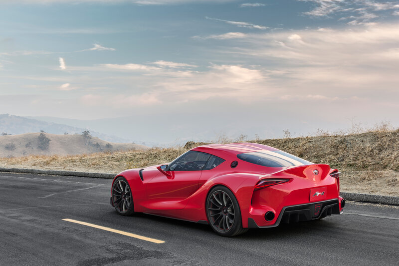 Red sports car on a road