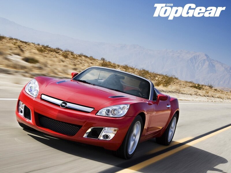 Red sports car on a road