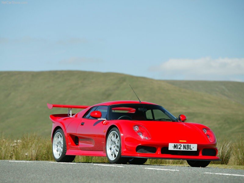 Red sports car on a road