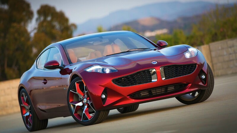 Red sports car on a road