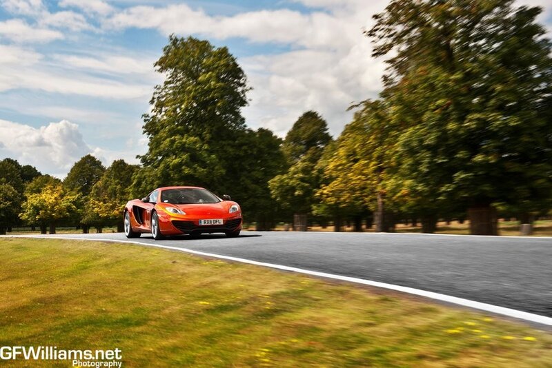 Red sports car on a road