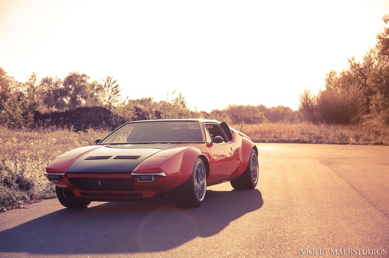 Red sports car on a road