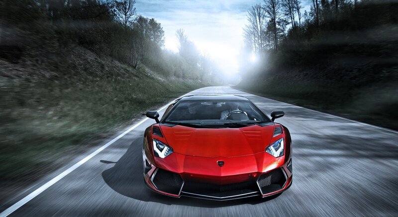 red sports car on a road