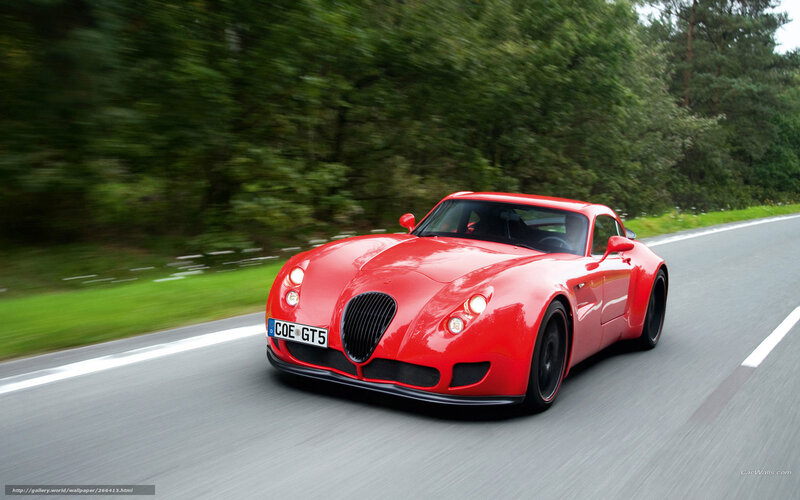 Red sports car on a road