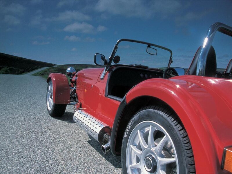 Red sports car on a road