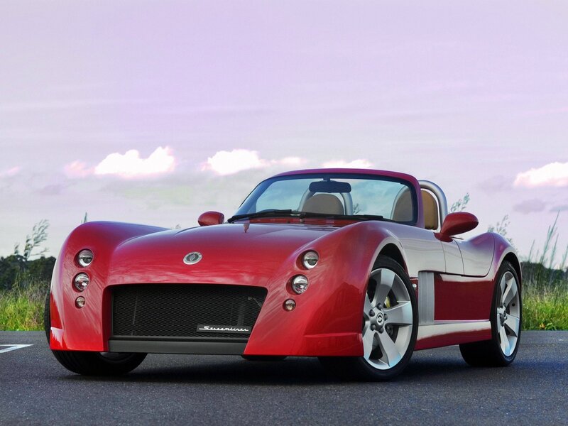 Red sports car on a road