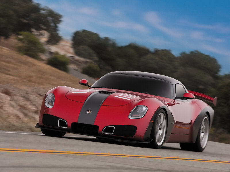 Red sports car on a road