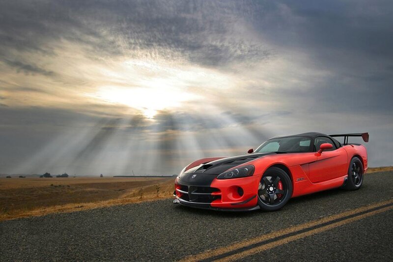 Red sports car on a road