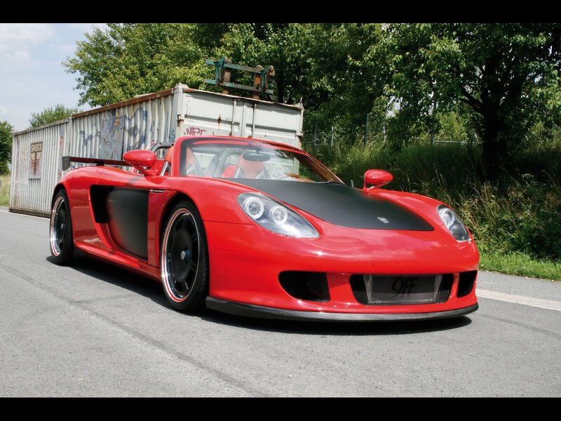 Red sports car on a road