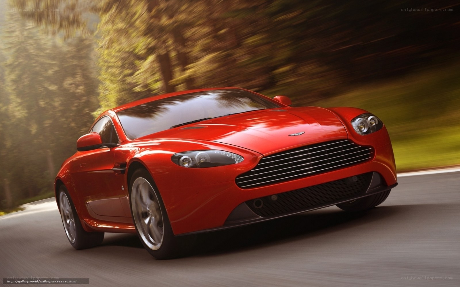 Red sports car on a road