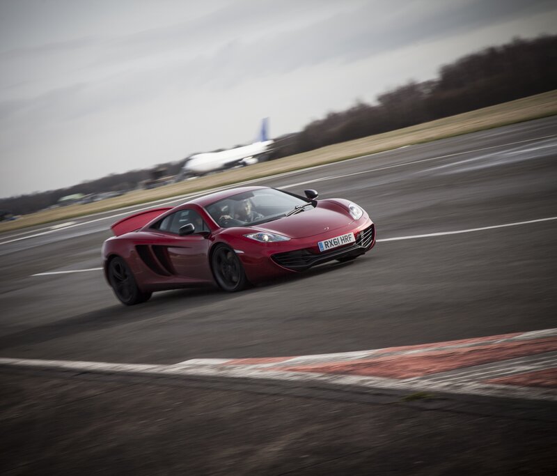 Red sports car on a track