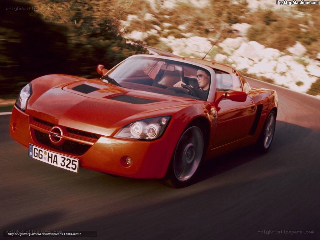 Red sports car on a winding road