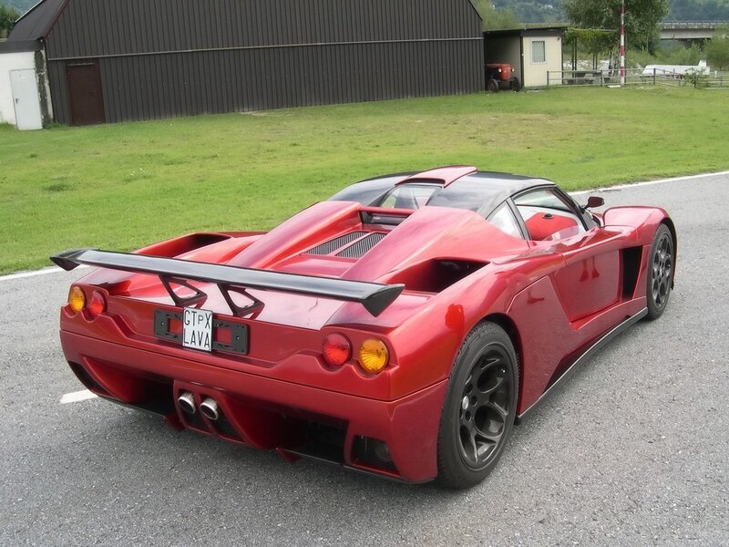 Red sports car on asphalt