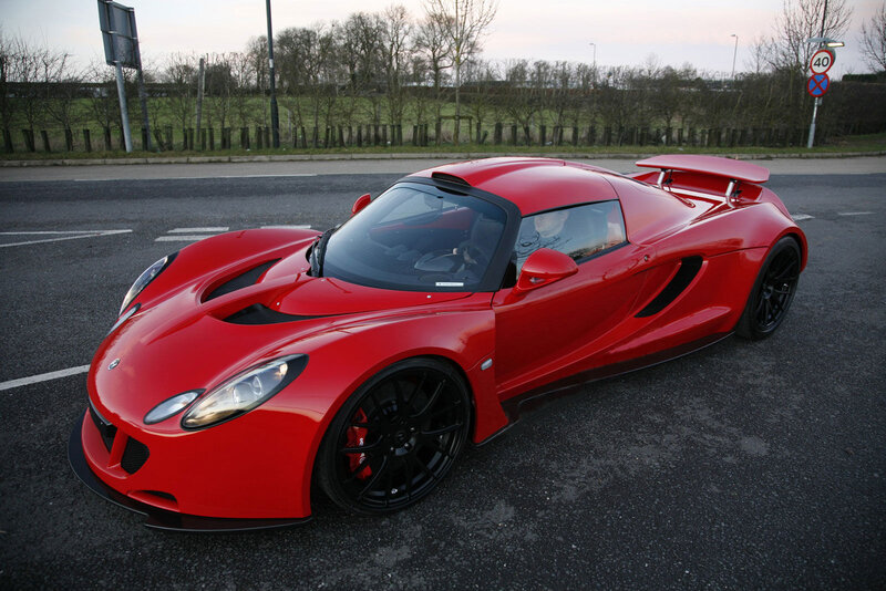Red sports car on asphalt