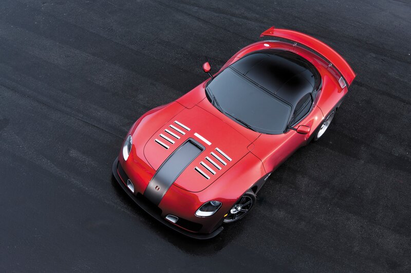 Red sports car on asphalt