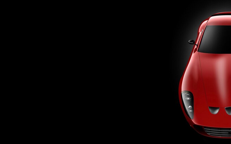 red sports car on black background
