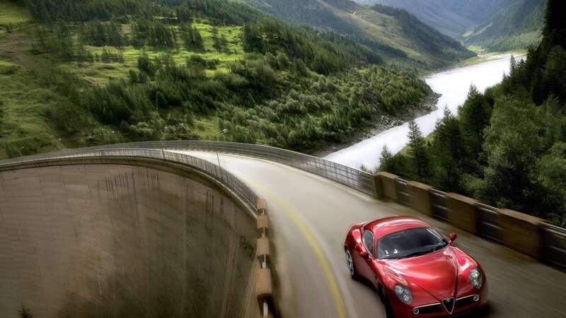 Red Sports Car on Bridge — Dynamic, Afternoon
