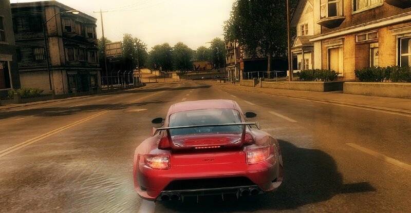 Red sports car on city street
