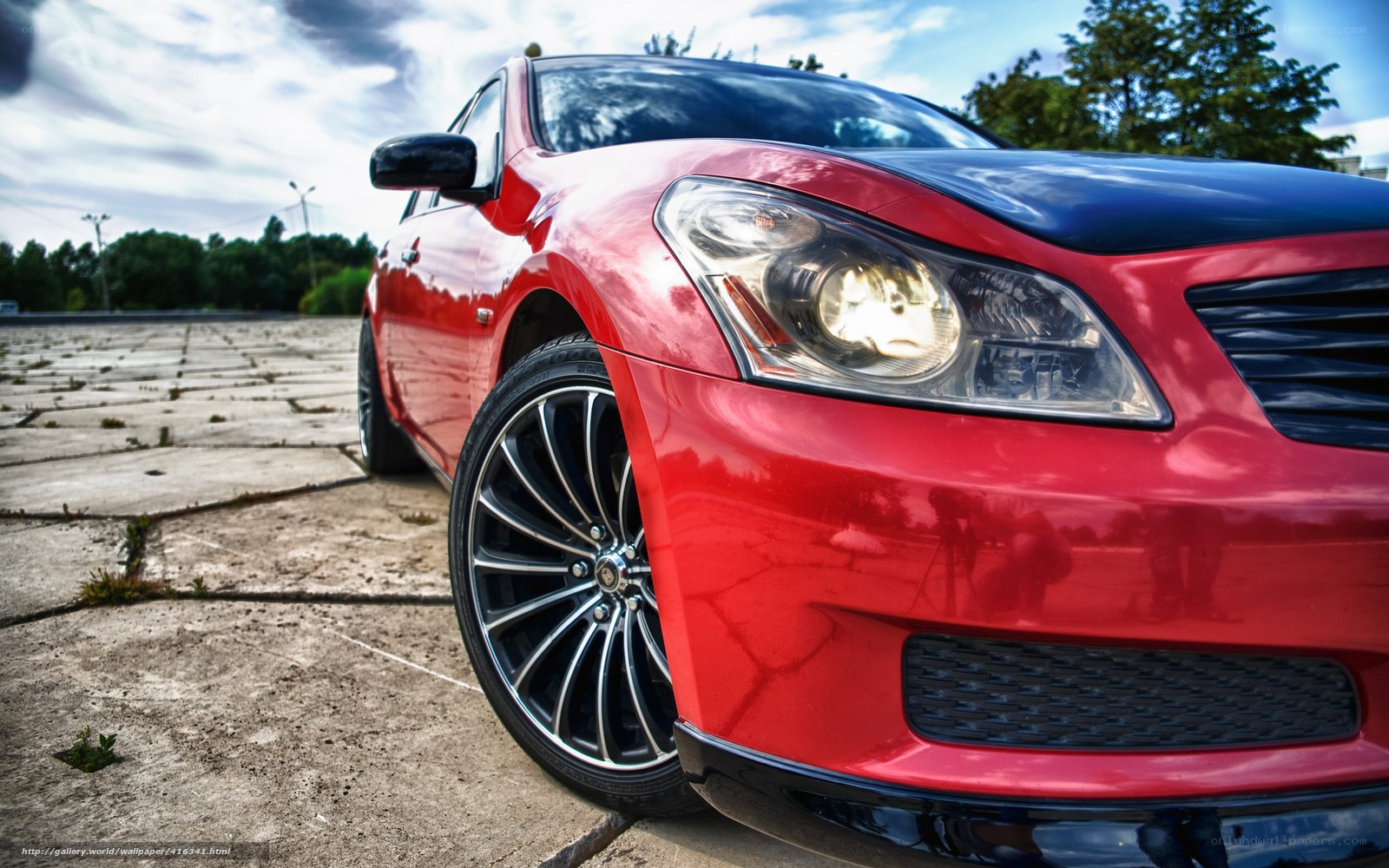Red sports car on concrete