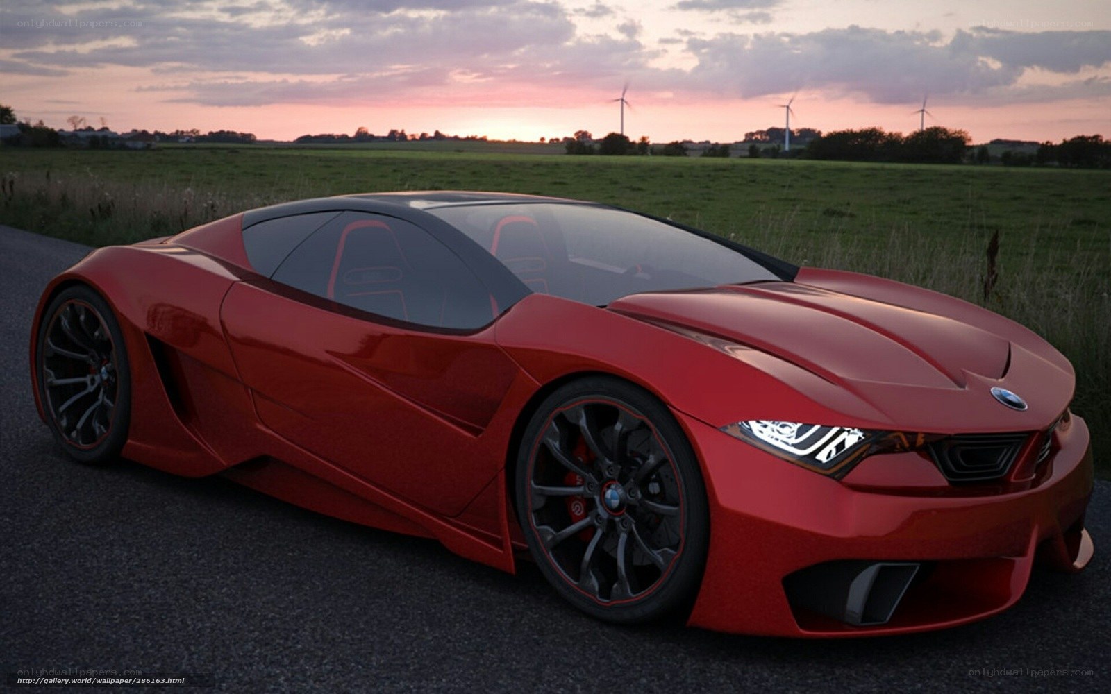 Red sports car on country road
