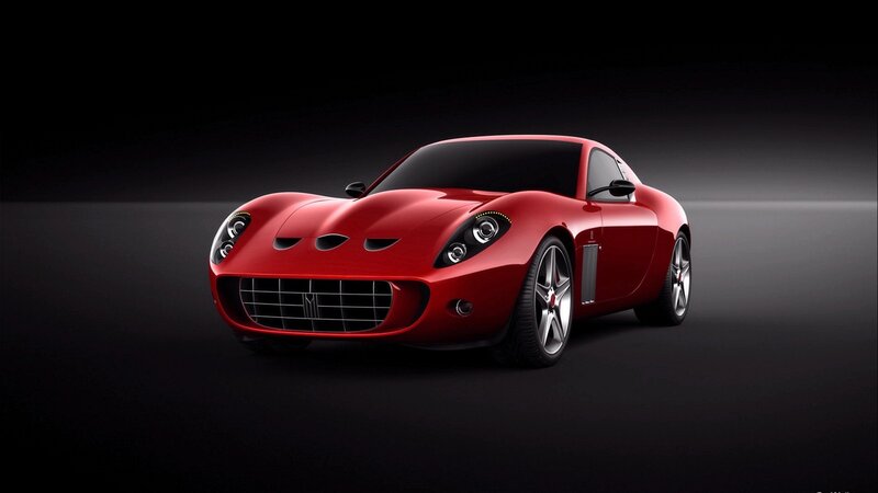 Red sports car on dark background