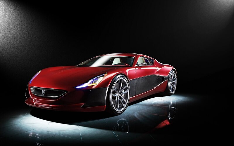 Red sports car on dark background