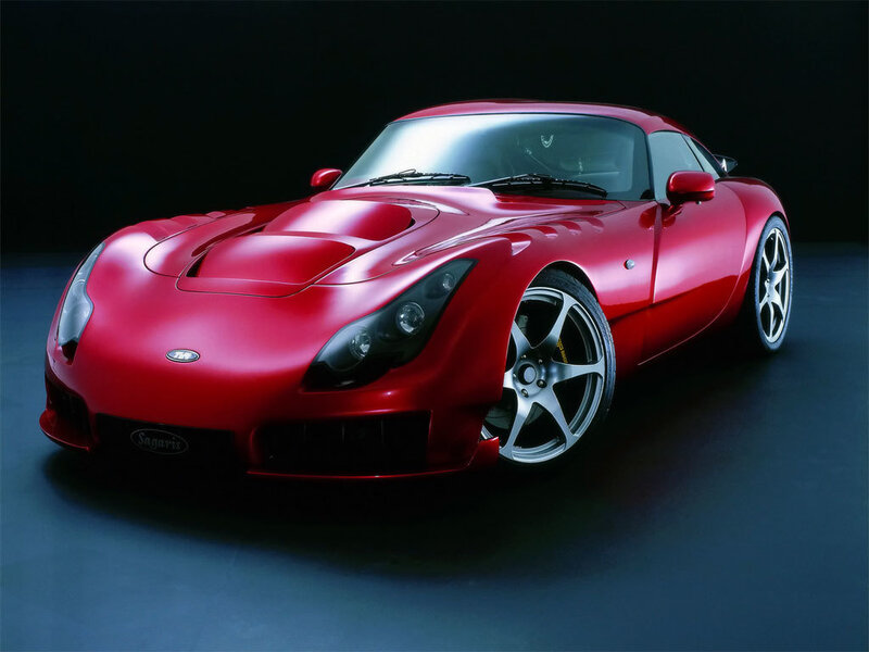 Red sports car on dark background